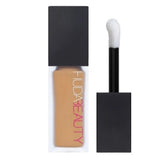 Huda Beauty FauxFilter Luminous Concealer Conceals Dark Circles, Blurs Skin & Brightens Under-Eyes #color_Toasted Almond
