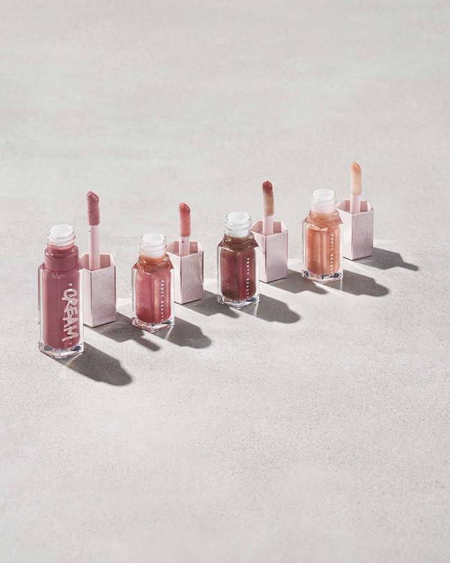 Fenty Beauty Posse Fantasy 4Sum Gloss Bomb Lipgloss Set, Candy Milk, Fenty Glow Fantasy, Hot Chocolate Fantasy, and Champ Stamp Fantasy